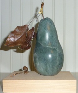 Pear in soapstone with leaf and goldleaf enhancement, collaboration of Irene and Emile Fairley-Beam